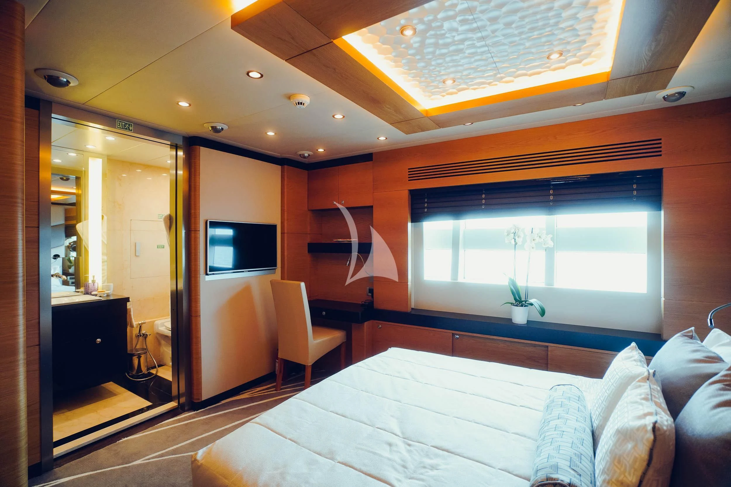 a living room with a large window aboard TATIANA I Yacht for Sale