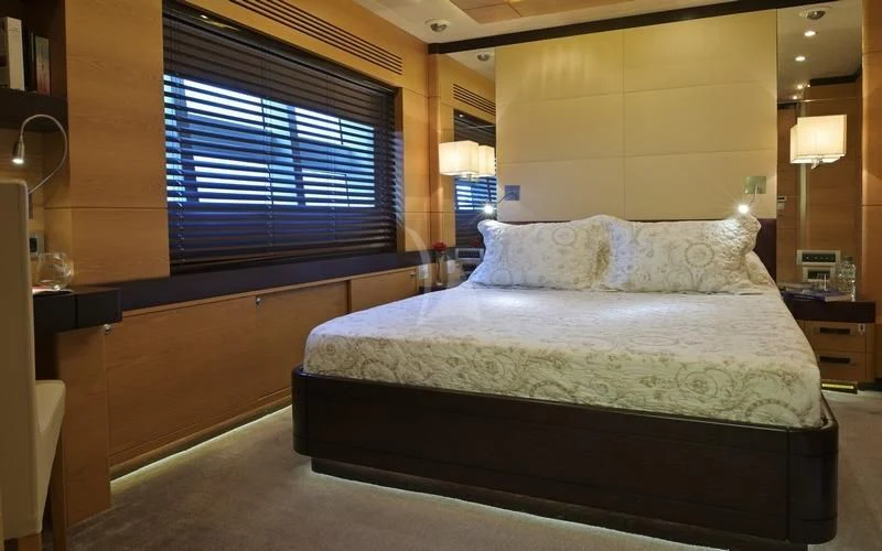 a bed in a room aboard TATIANA I Yacht for Sale