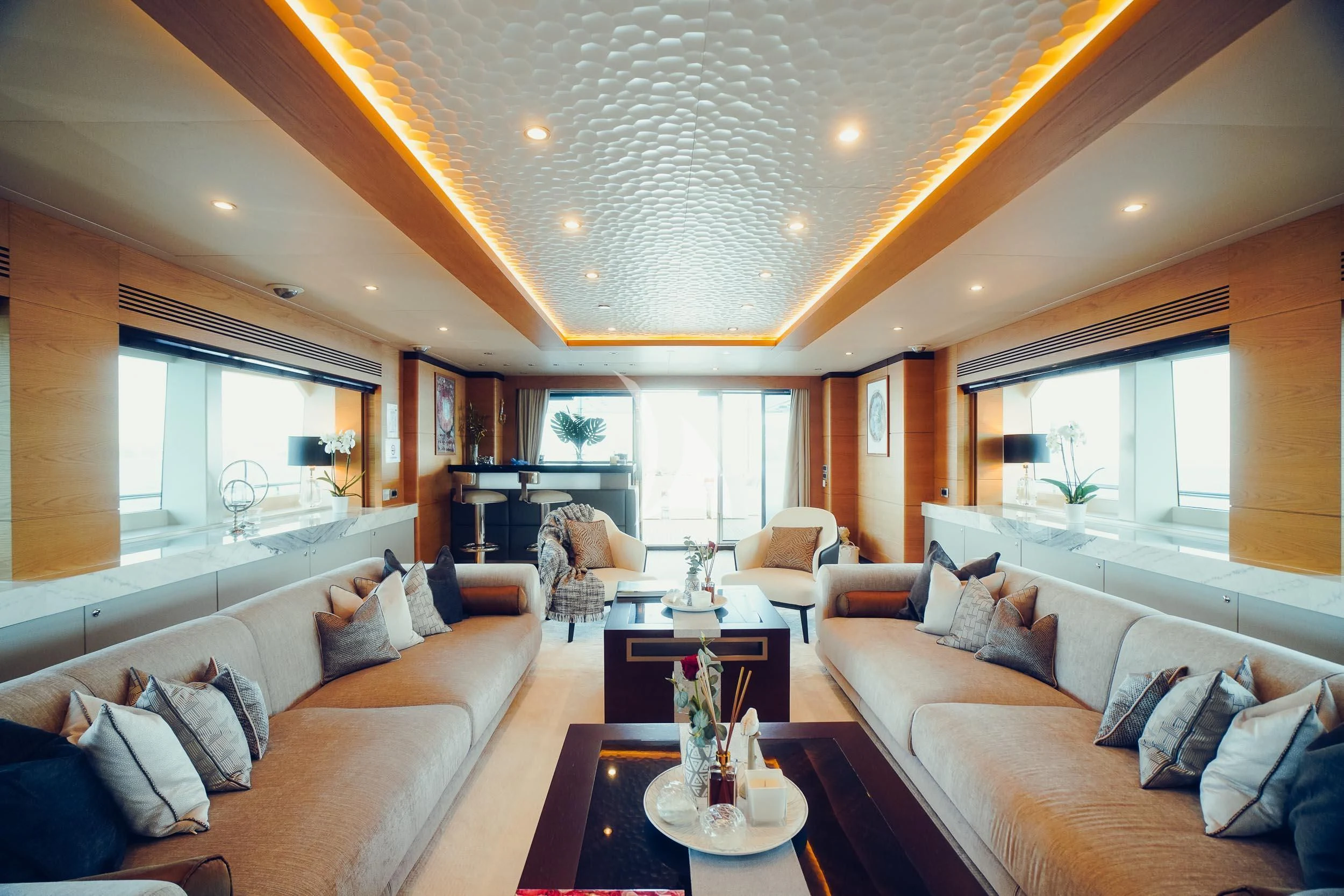 a living room with a large ceiling aboard TATIANA I Yacht for Sale