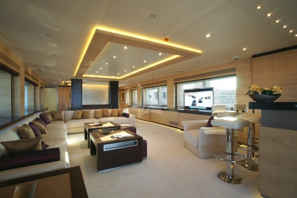 a living room with a large window aboard TATIANA I Yacht for Sale