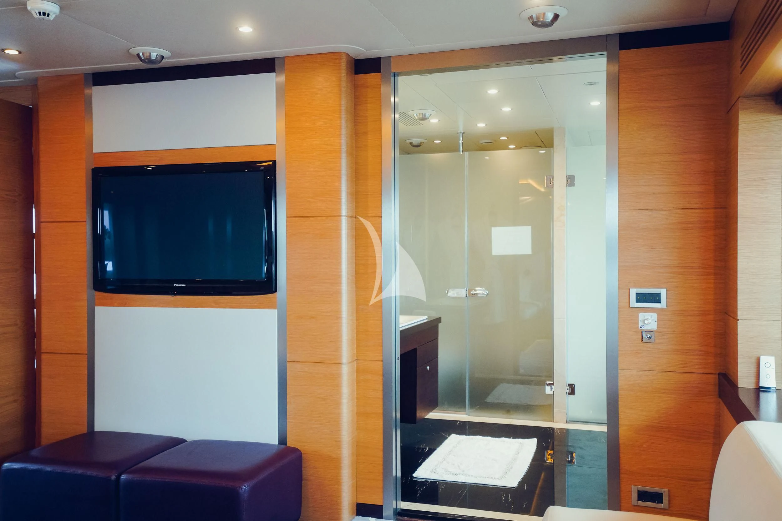 a bathroom with a large glass shower aboard TATIANA I Yacht for Sale