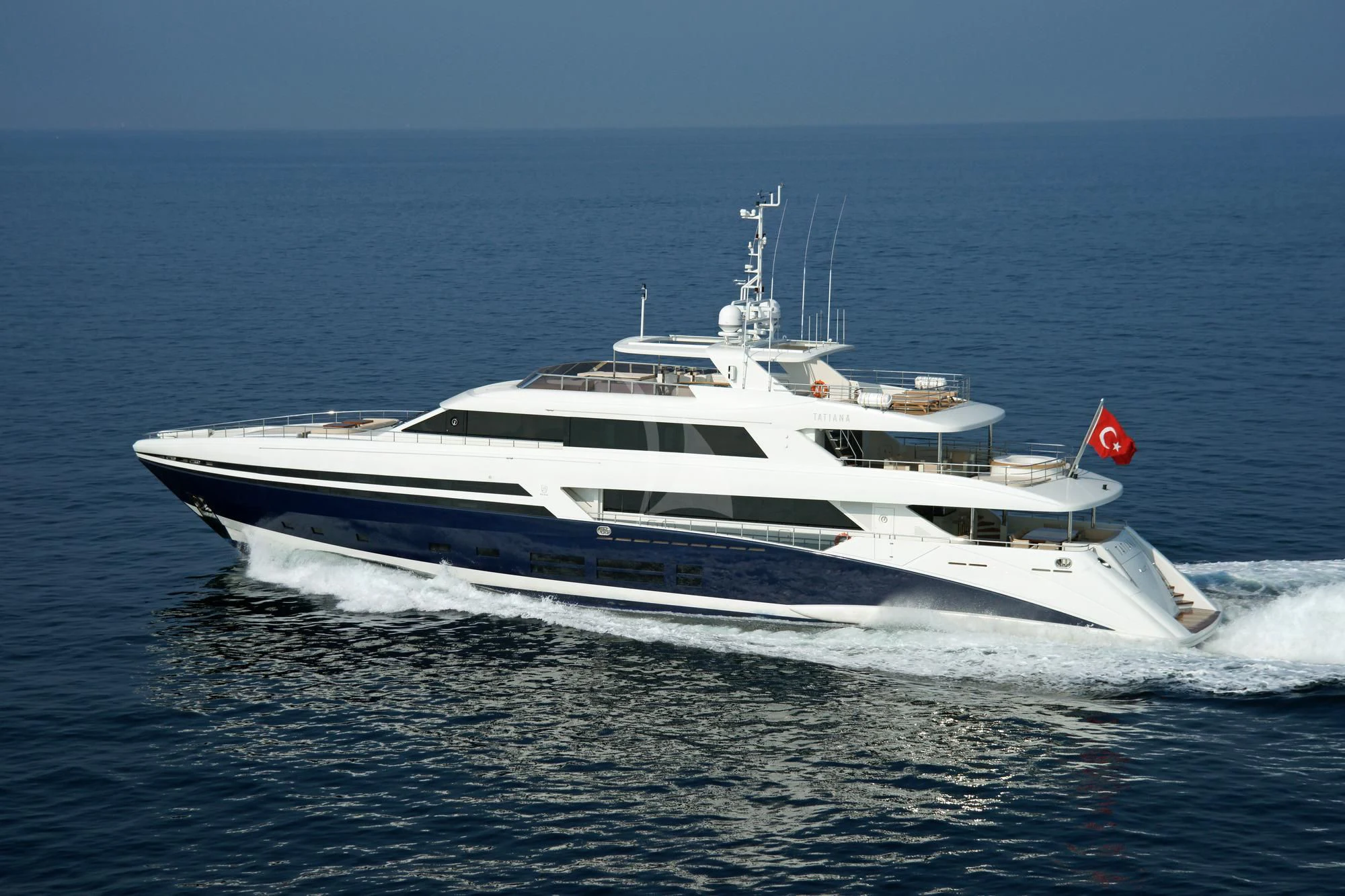 a white yacht in the water aboard TATIANA I Yacht for Sale