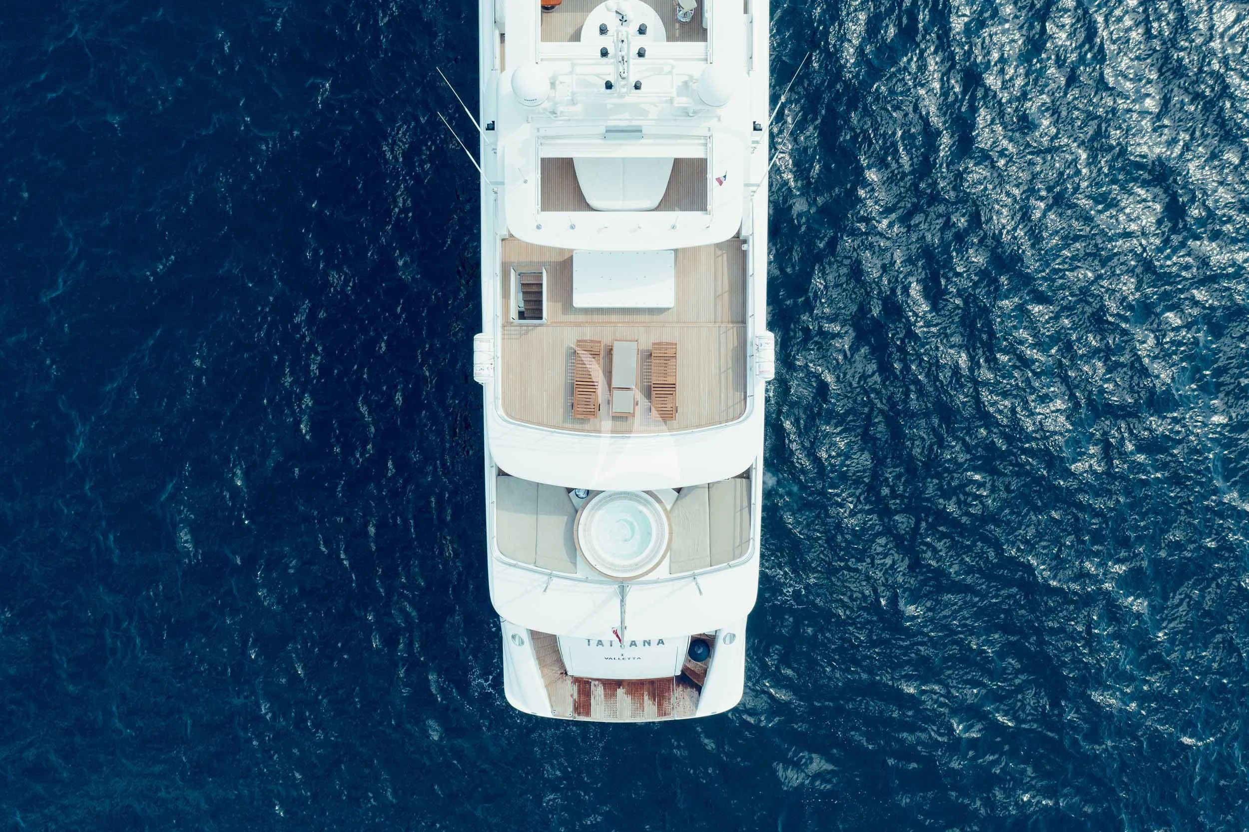 a white tower in the water aboard TATIANA I Yacht for Sale