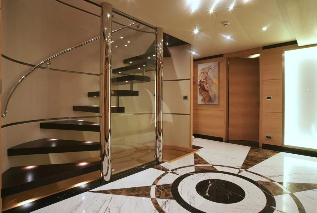 a metal staircase in a room aboard TATIANA I Yacht for Sale