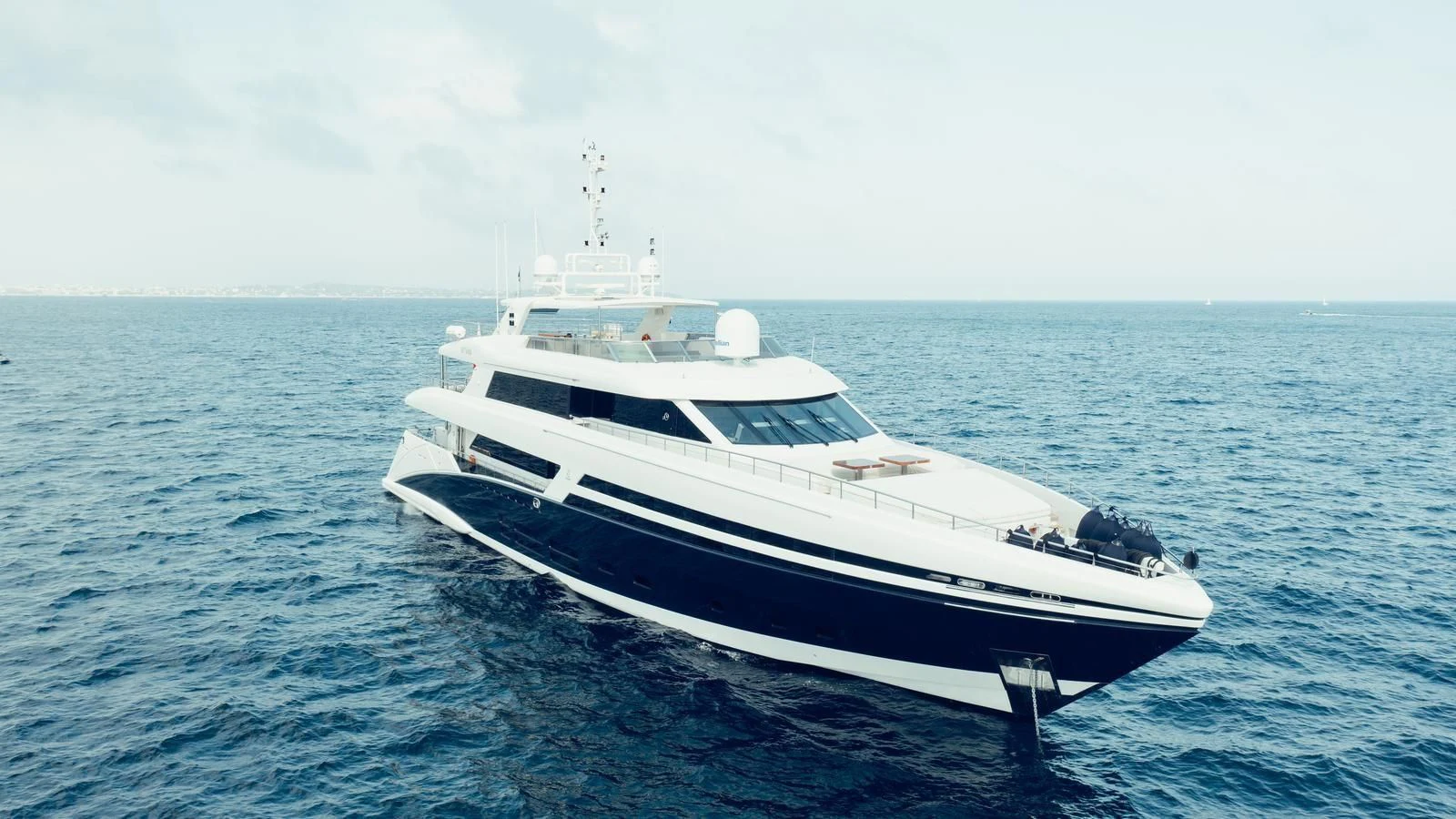 a white yacht in the water aboard TATIANA I Yacht for Sale