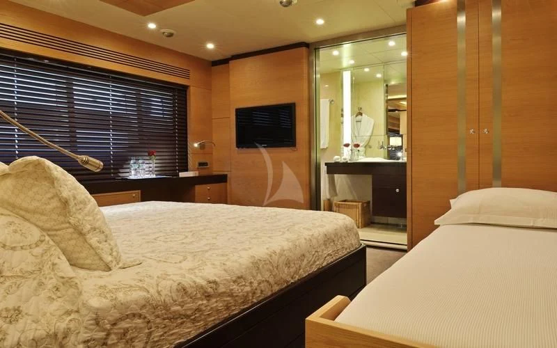 a room with two beds aboard TATIANA I Yacht for Sale