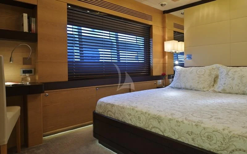 a bed in a room aboard TATIANA I Yacht for Sale