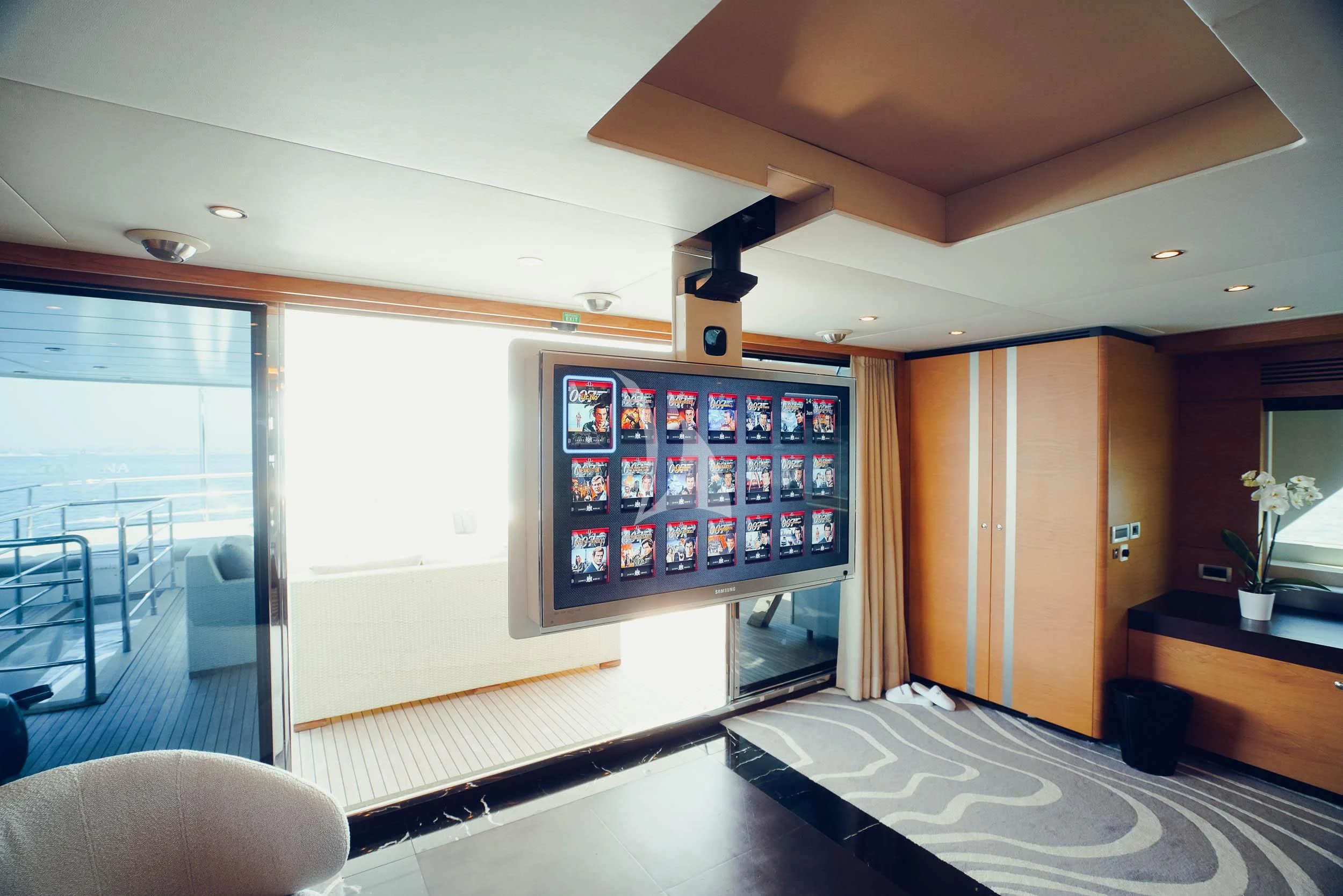 a room with a large tv aboard TATIANA I Yacht for Sale