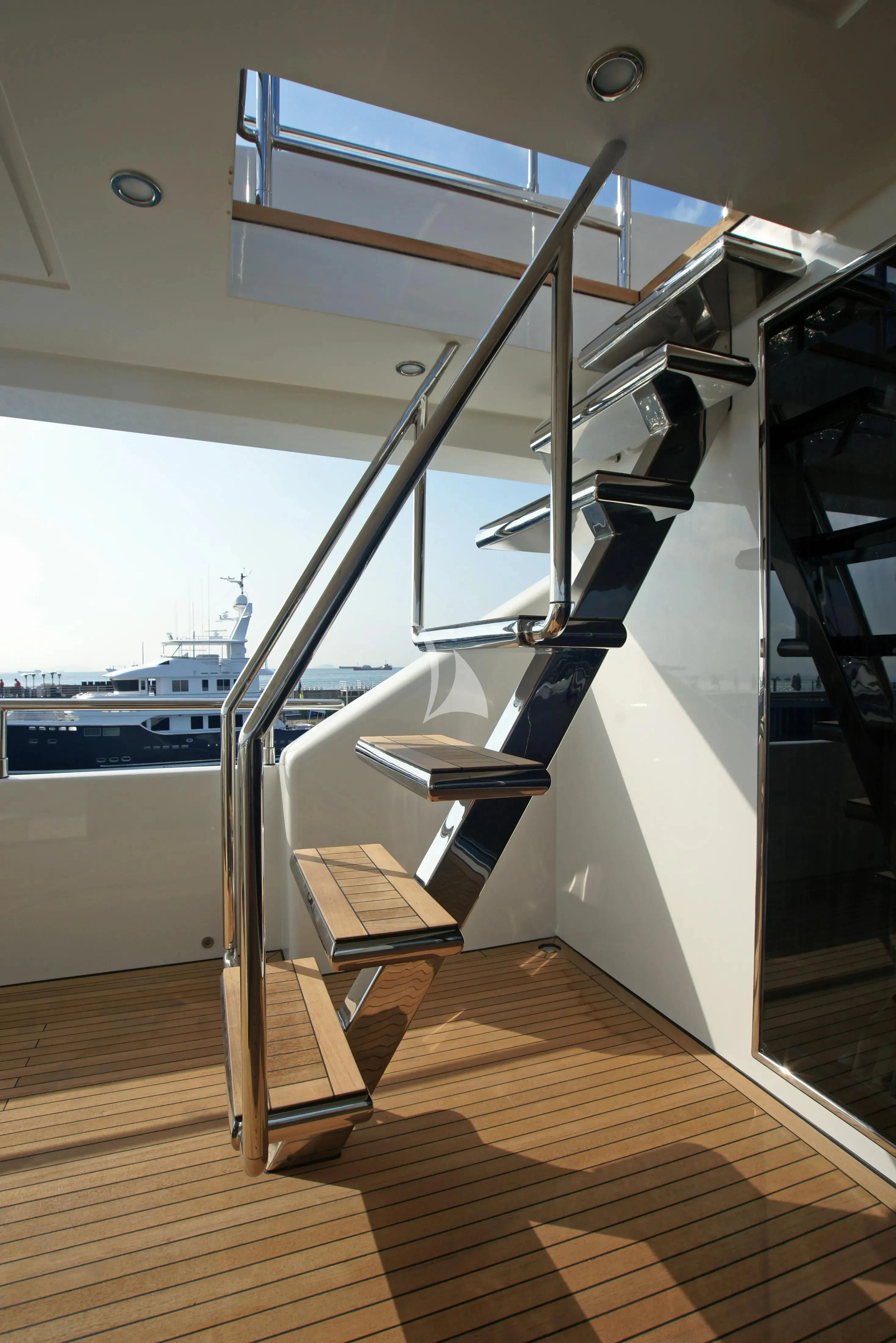a staircase with a railing aboard TATIANA I Yacht for Sale
