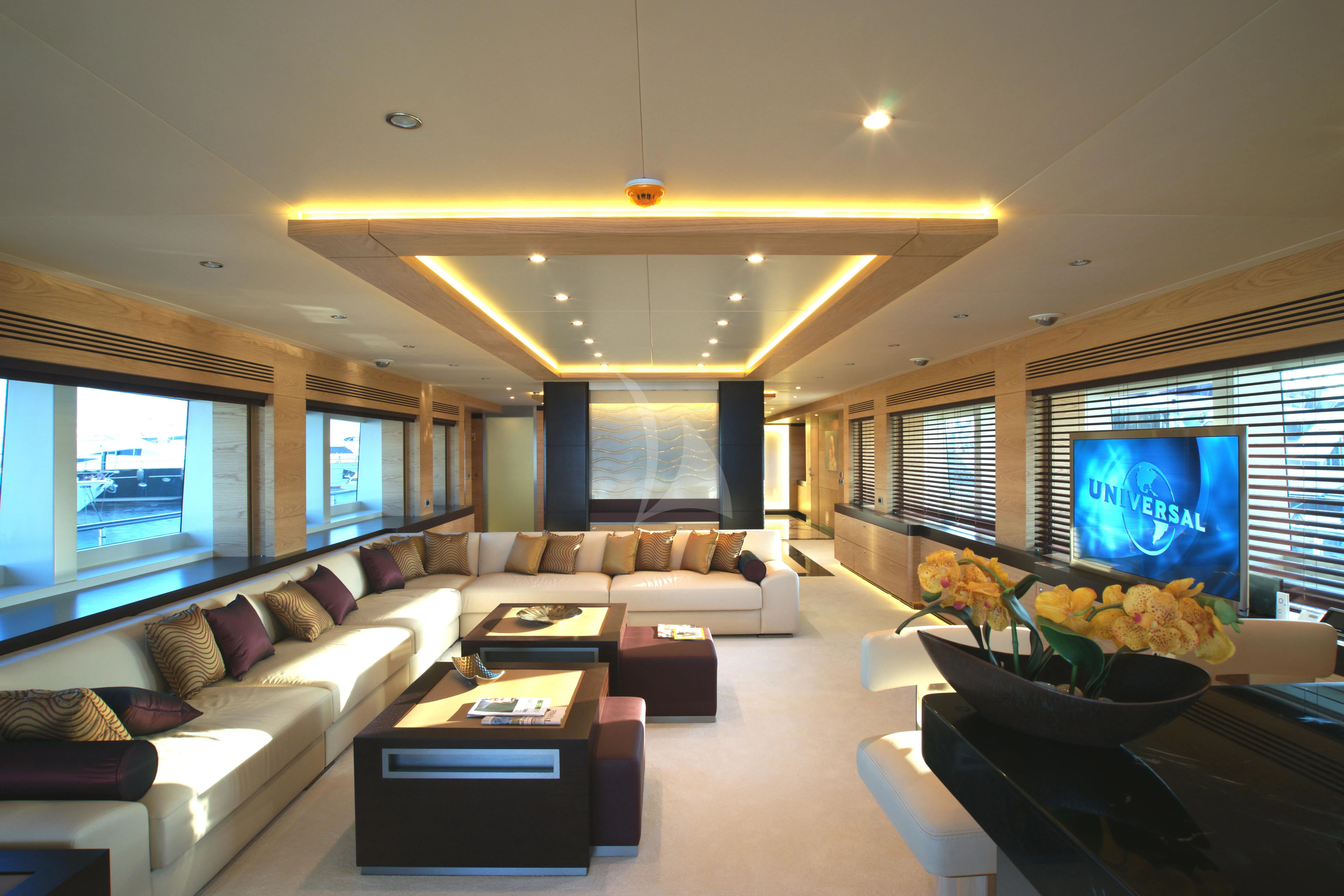 a living room with a large window aboard TATIANA I Yacht for Sale