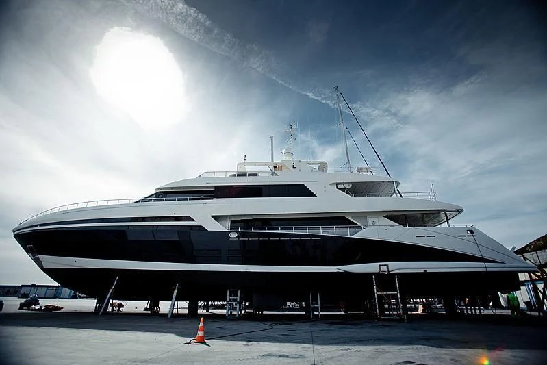 a large cruise ship docked aboard TATIANA I Yacht for Sale