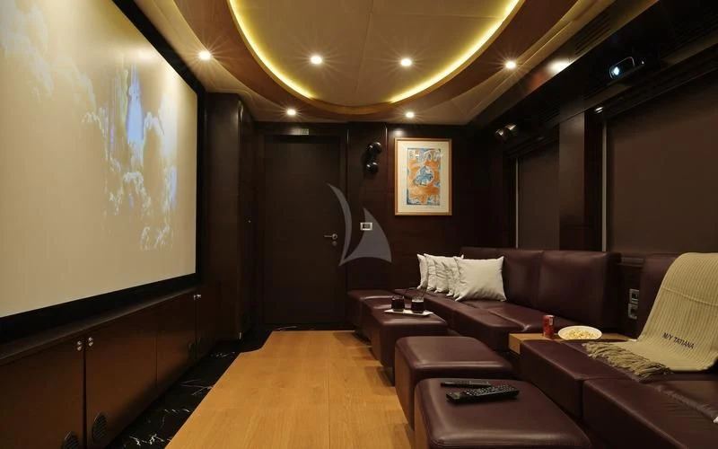 a room with a couch and a table aboard TATIANA I Yacht for Sale