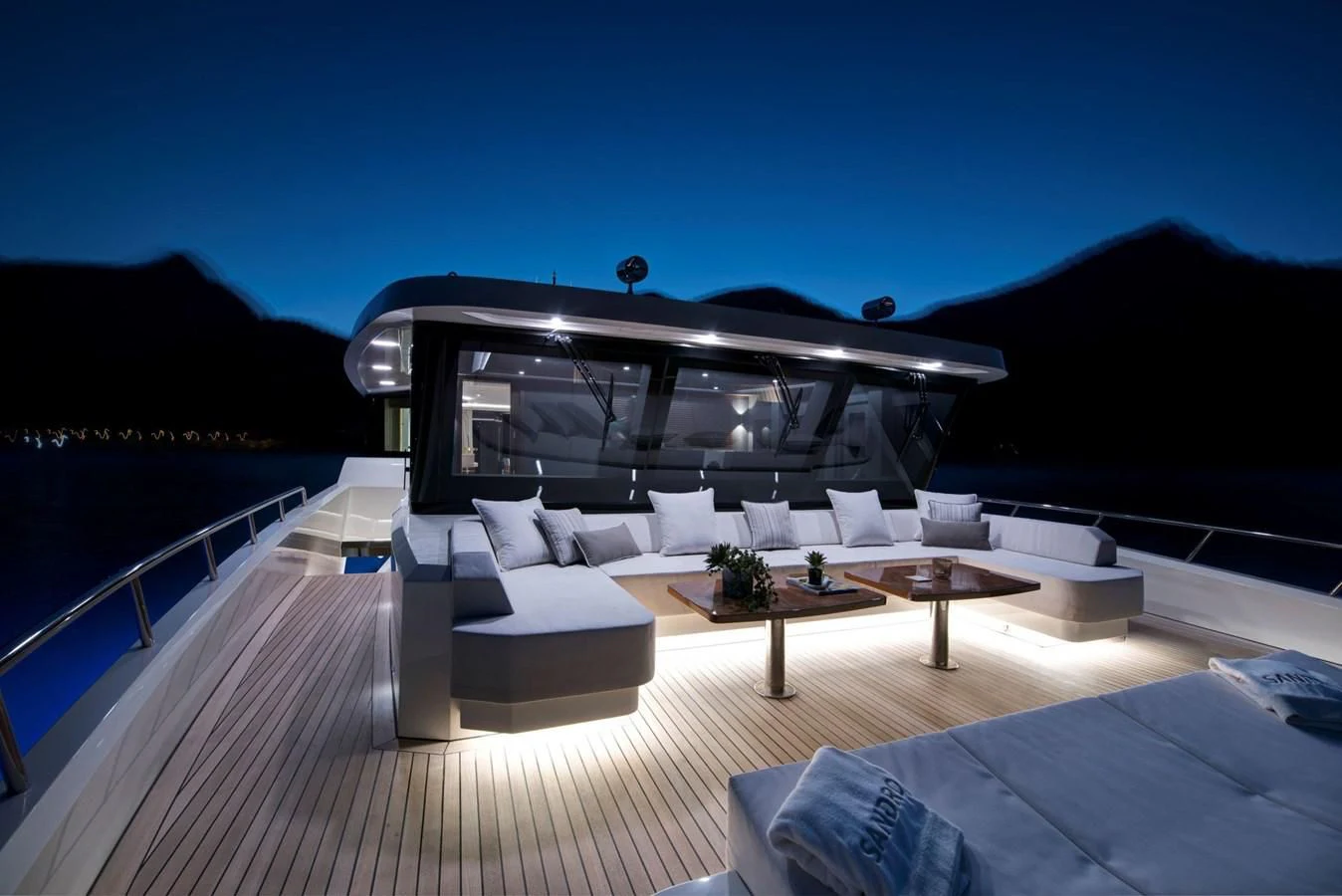 a modern house with a large swimming pool aboard SANDRO Yacht for Sale