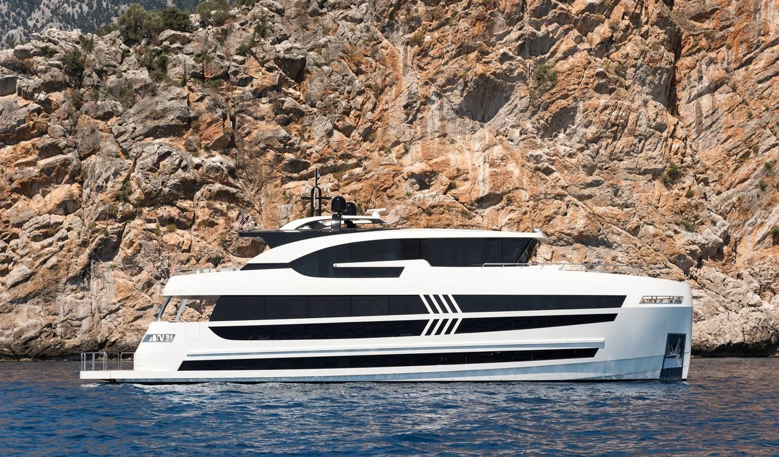 a white yacht in the water aboard SANDRO Yacht for Sale