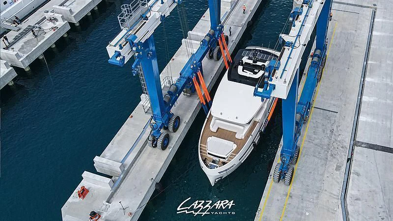 a large ship in the water aboard SANDRO Yacht for Sale