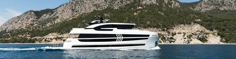 a white boat in the water aboard SANDRO Yacht for Sale