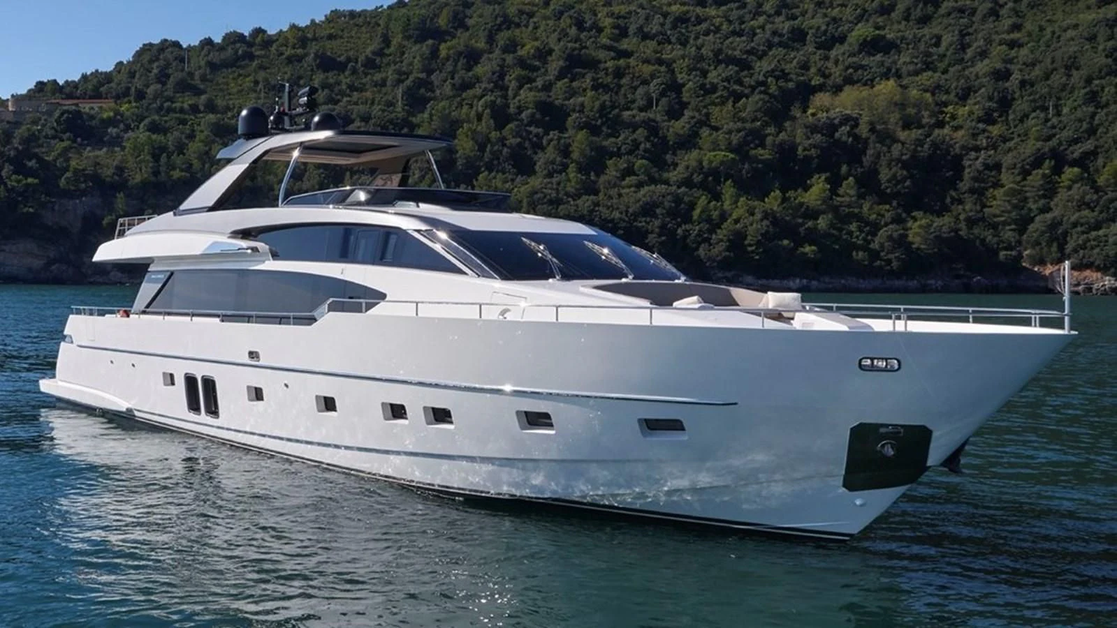 a white yacht in the water aboard SEN Yacht for Sale