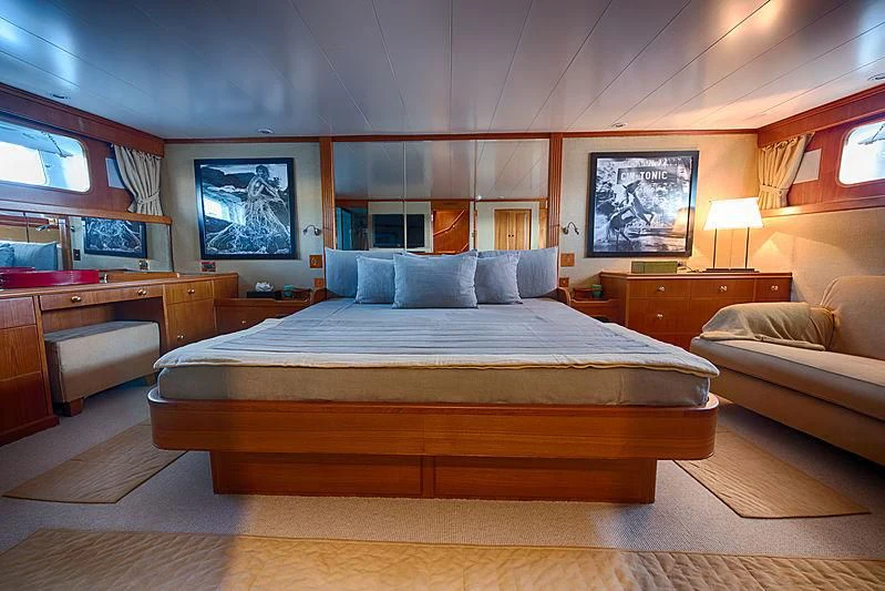 a bed in a room aboard JURA II Yacht for Sale