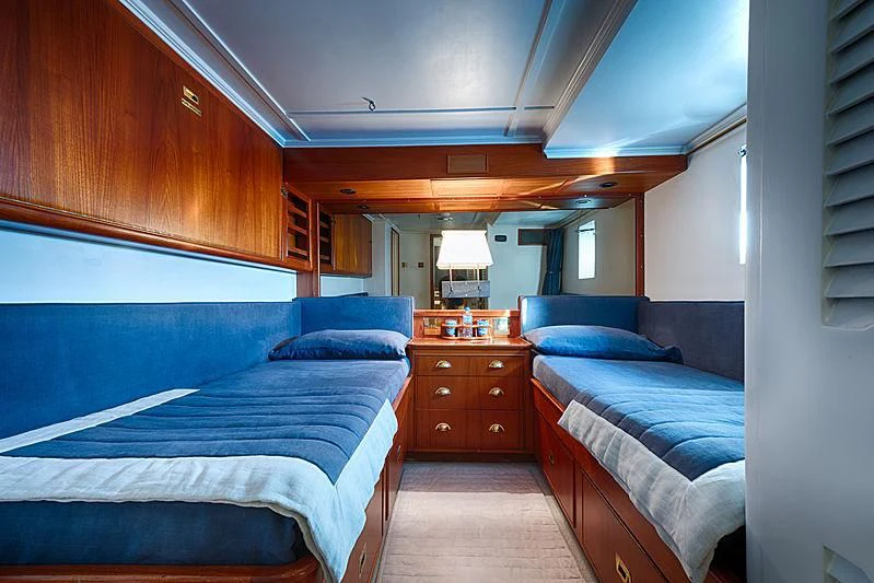 a room with two beds aboard JURA II Yacht for Sale