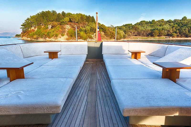 a dock with benches on it aboard JURA II Yacht for Sale