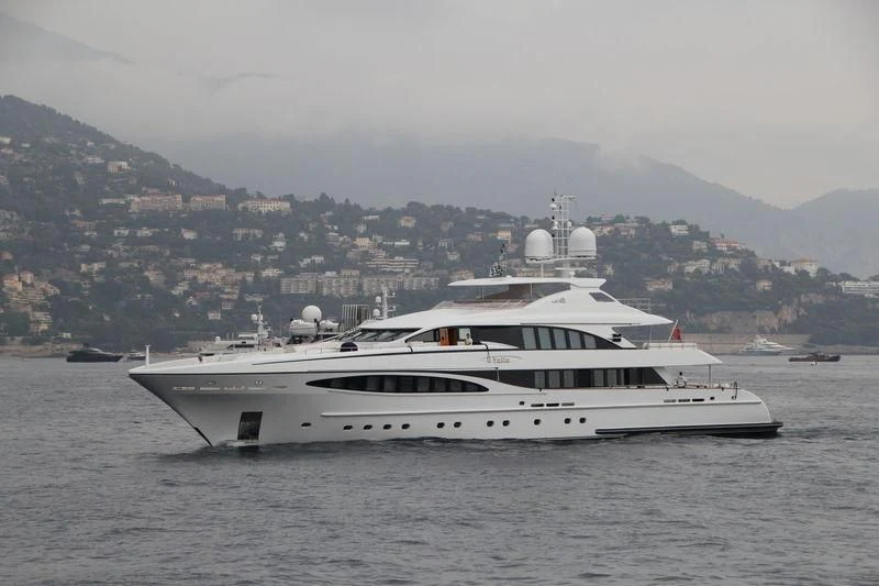 a large white boat in the water aboard YALLA Yacht for Sale