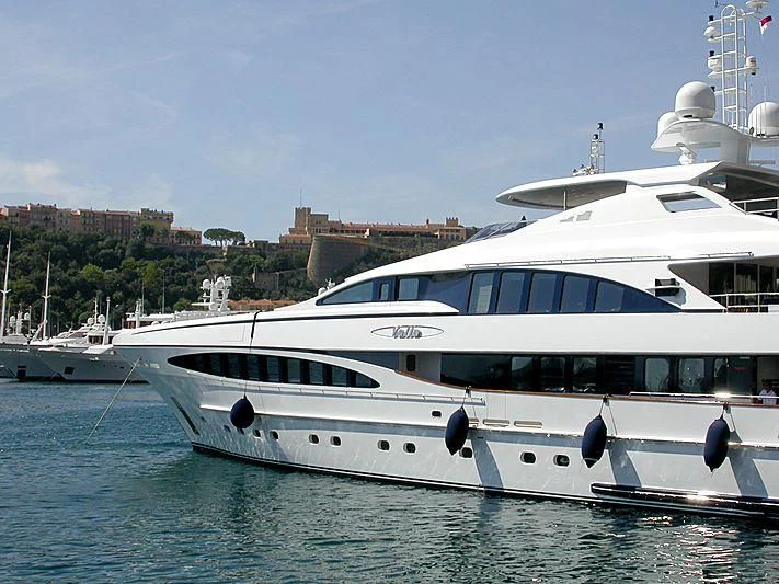 a white yacht in the water aboard YALLA Yacht for Sale