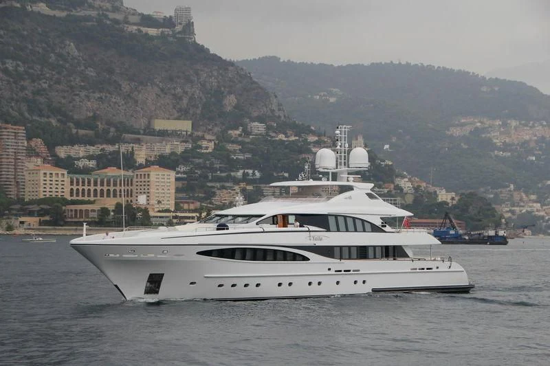 a white boat in the water aboard YALLA Yacht for Sale