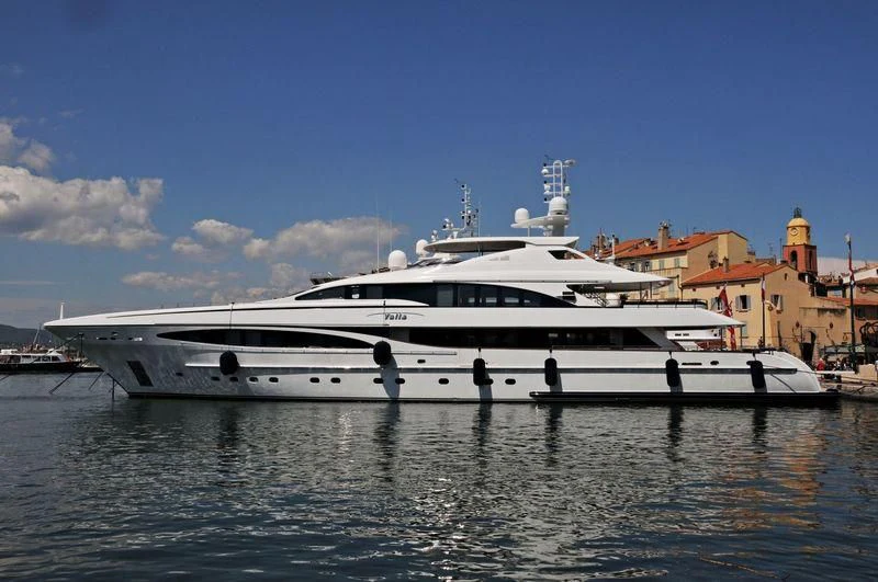 a white yacht in the water aboard YALLA Yacht for Sale