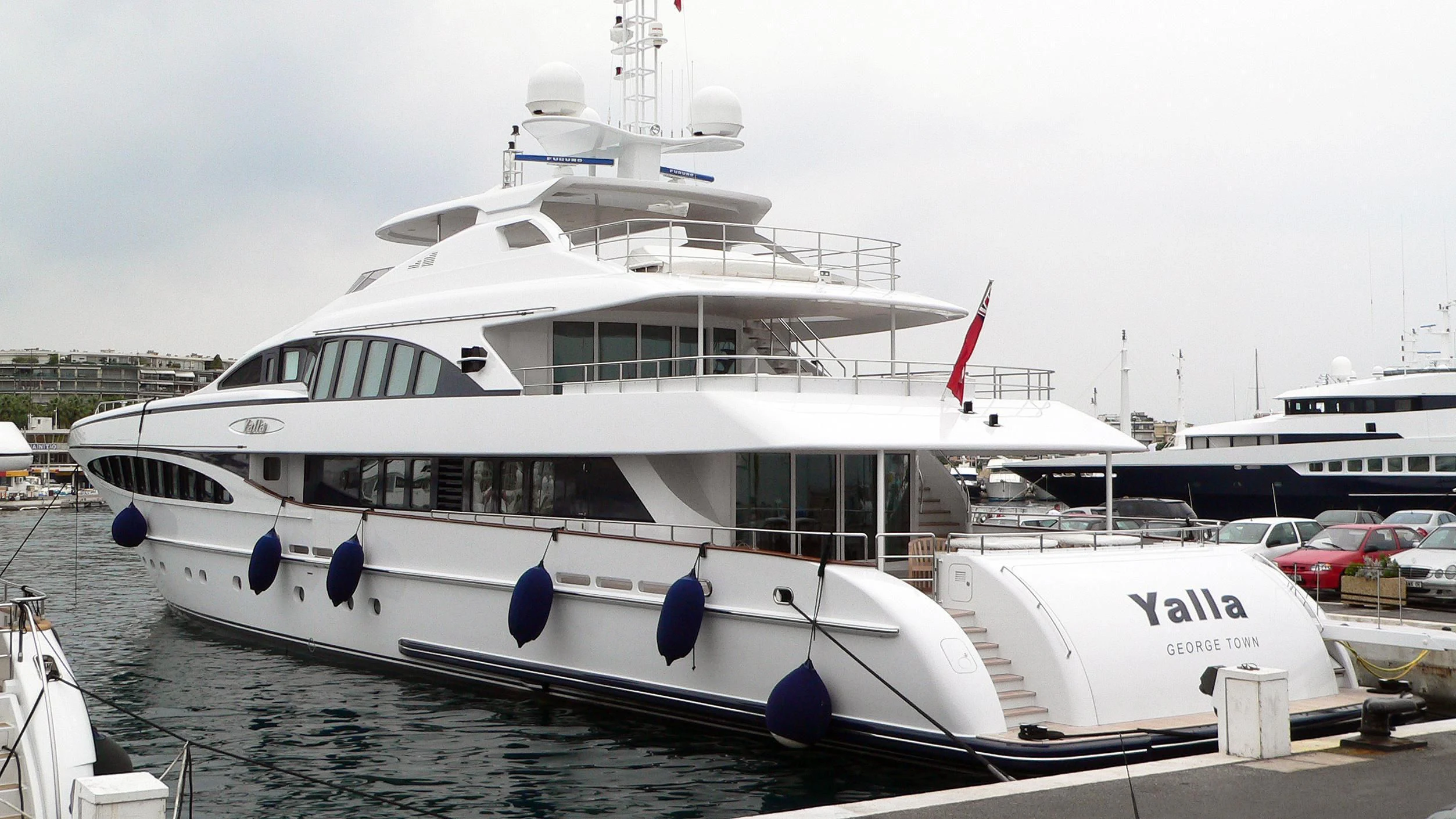a large white boat aboard YALLA Yacht for Sale