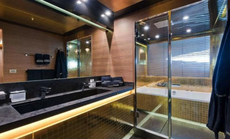a bathroom with a large glass shower aboard ELIZAVETA Yacht for Sale
