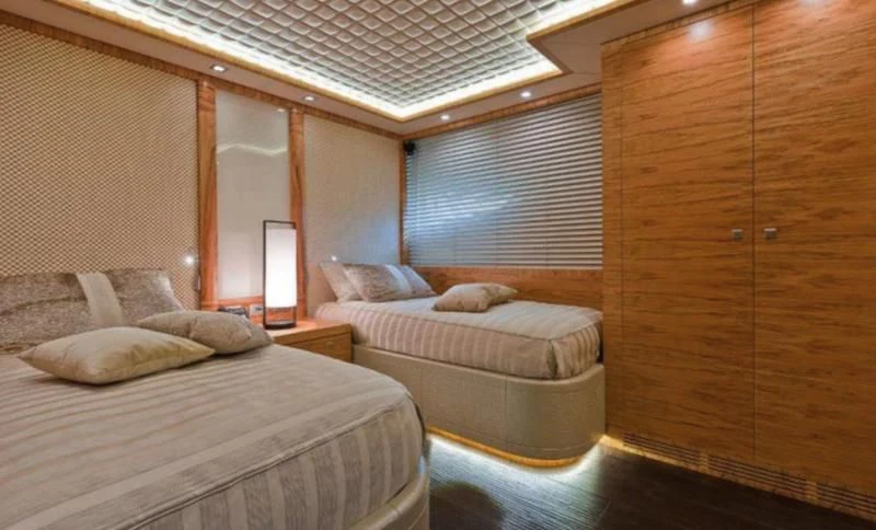 a room with two beds aboard ELIZAVETA Yacht for Sale