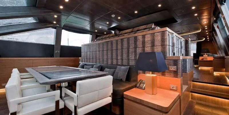 a room with a table and chairs aboard ELIZAVETA Yacht for Sale