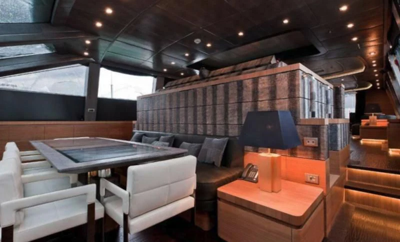 a room with a table and chairs aboard ELIZAVETA Yacht for Sale