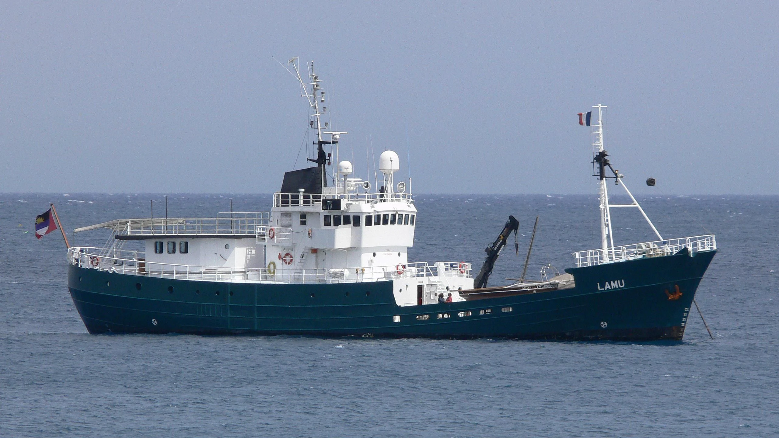 a large boat in the water aboard KREBS RESEARCH Yacht for Sale