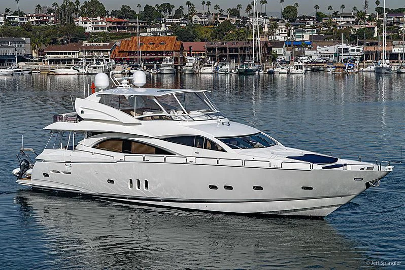 a white yacht in the water aboard NAKOA Yacht for Sale