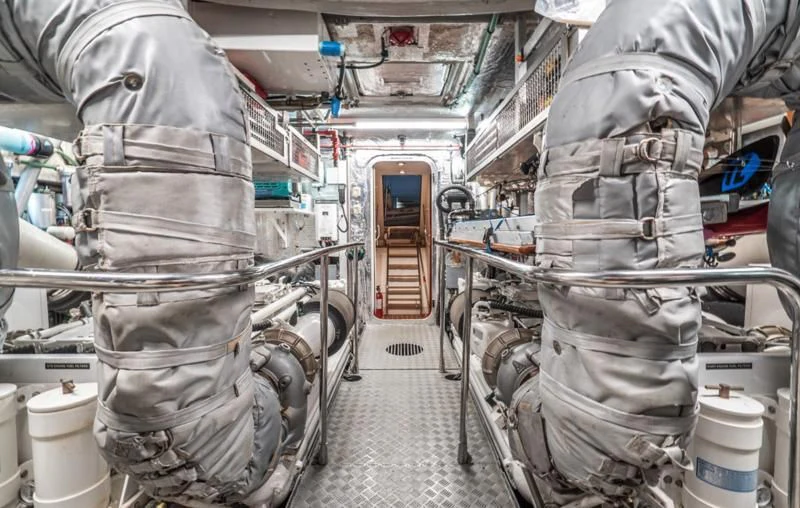 a few people in a room aboard NAKOA Yacht for Sale