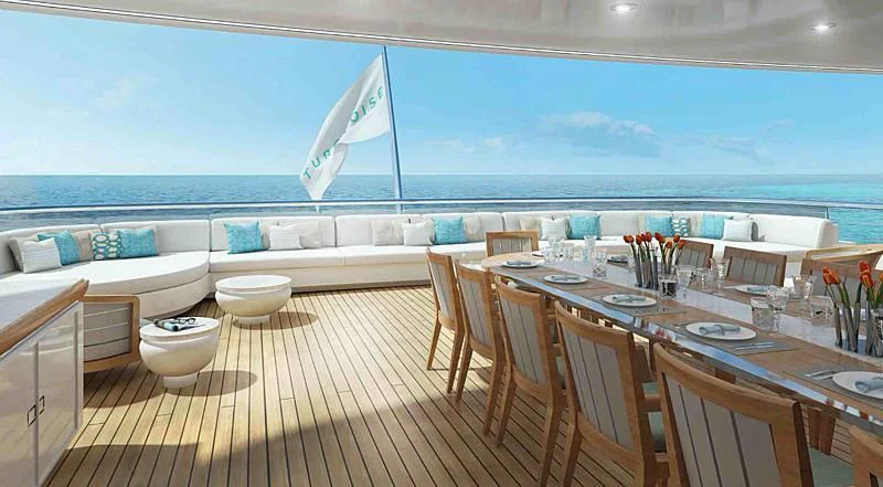 a large room with a table and chairs and a large body of water aboard INFINITE JEST Yacht for Sale