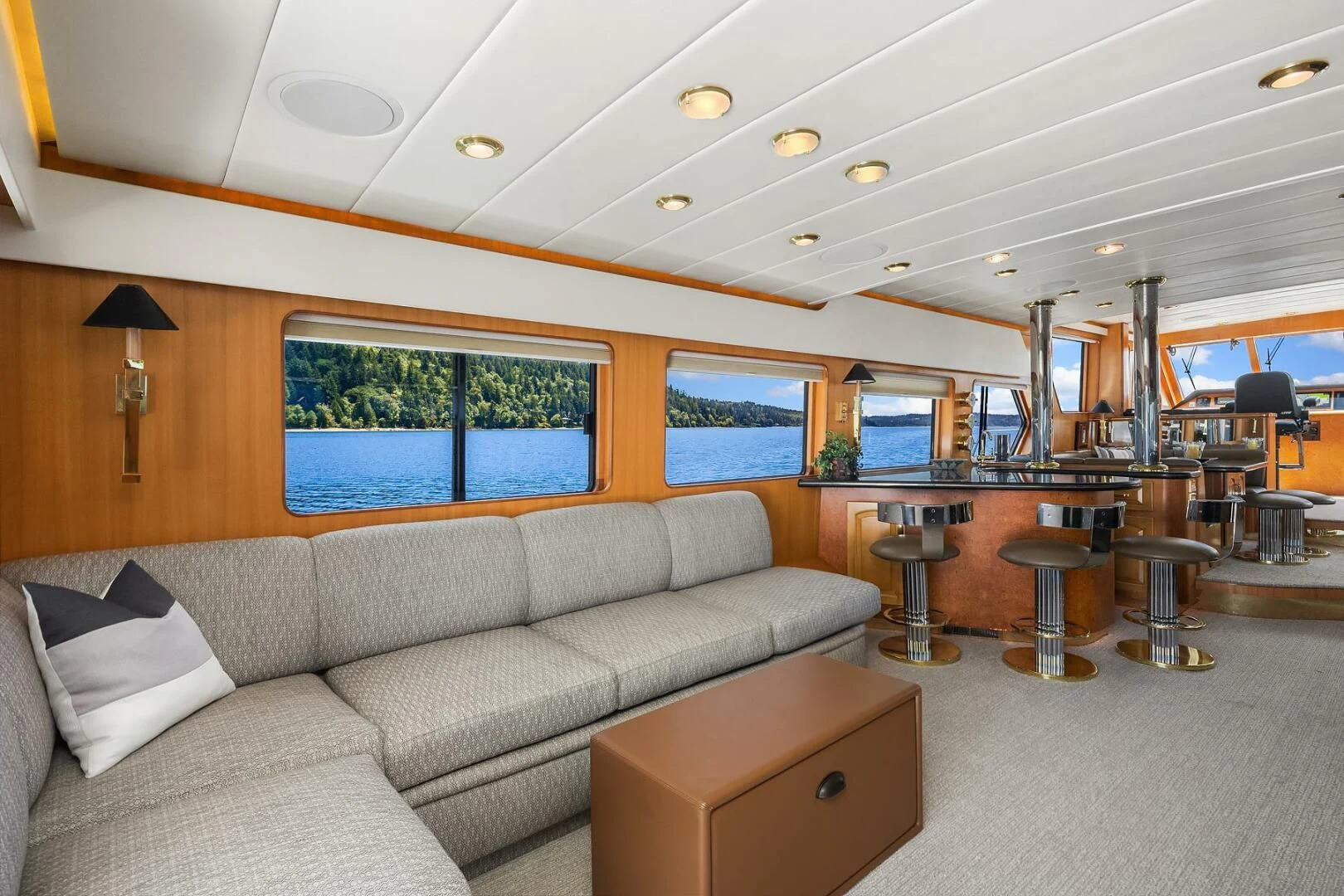 a living room with a couch and a table aboard QUE SA-RAH SA-RAH Yacht for Sale