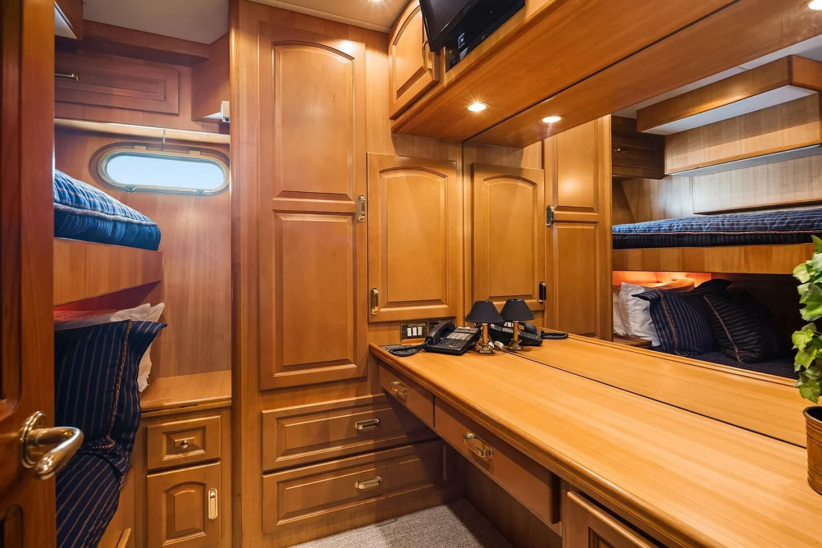 a kitchen with wooden cabinets aboard QUE SA-RAH SA-RAH Yacht for Sale