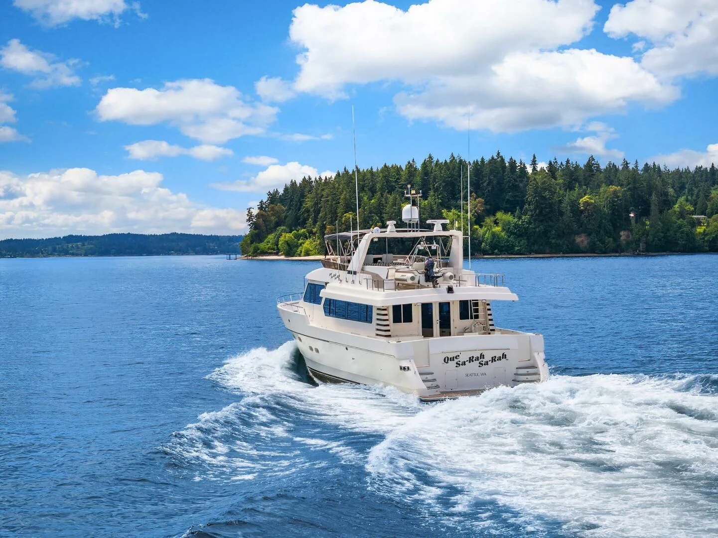 a boat on the water aboard QUE SA-RAH SA-RAH Yacht for Sale