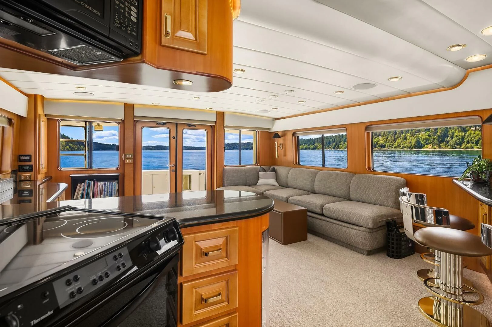 a kitchen with a couch and a table aboard QUE SA-RAH SA-RAH Yacht for Sale