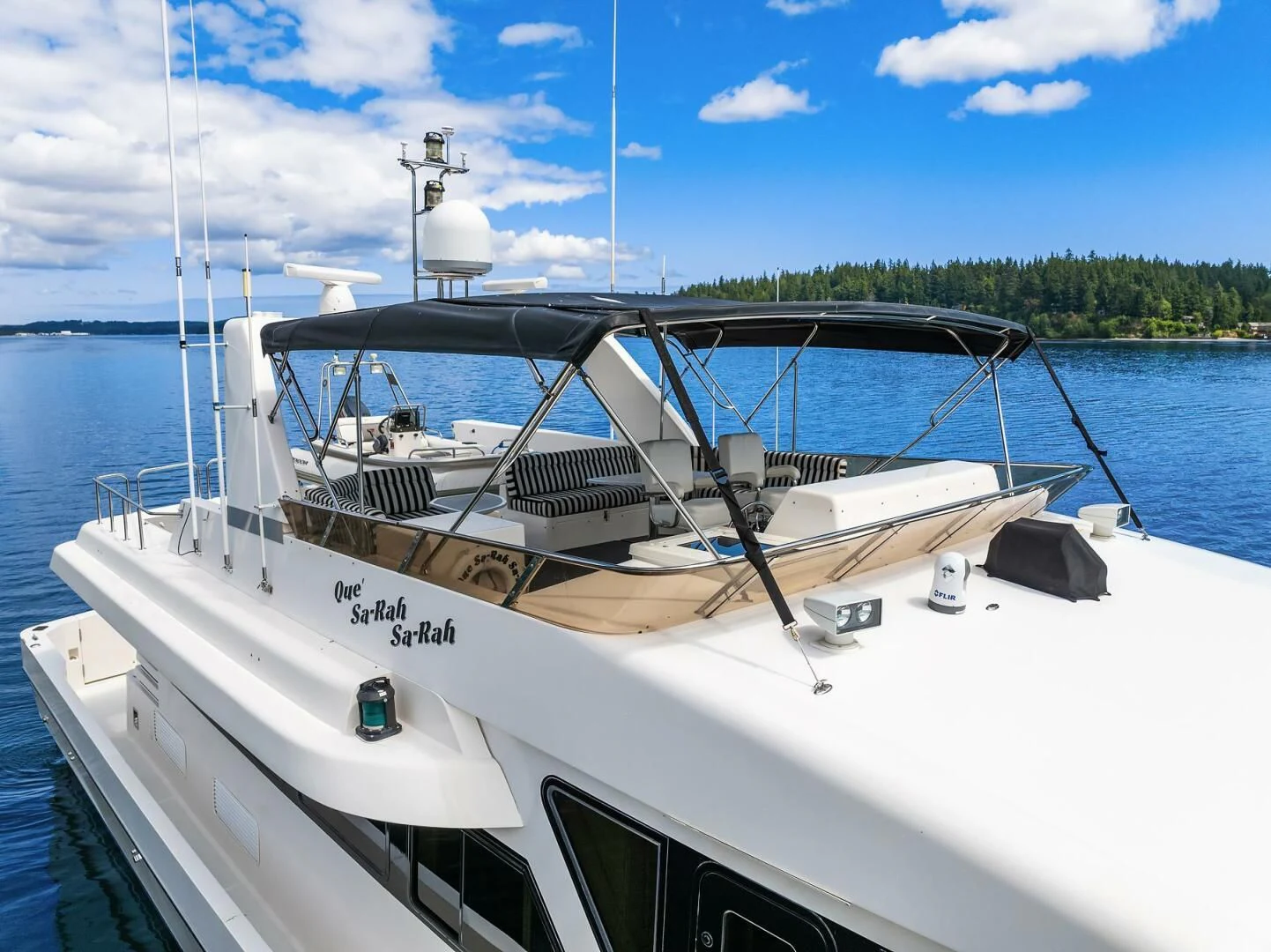 a white boat in the water aboard QUE SA-RAH SA-RAH Yacht for Sale