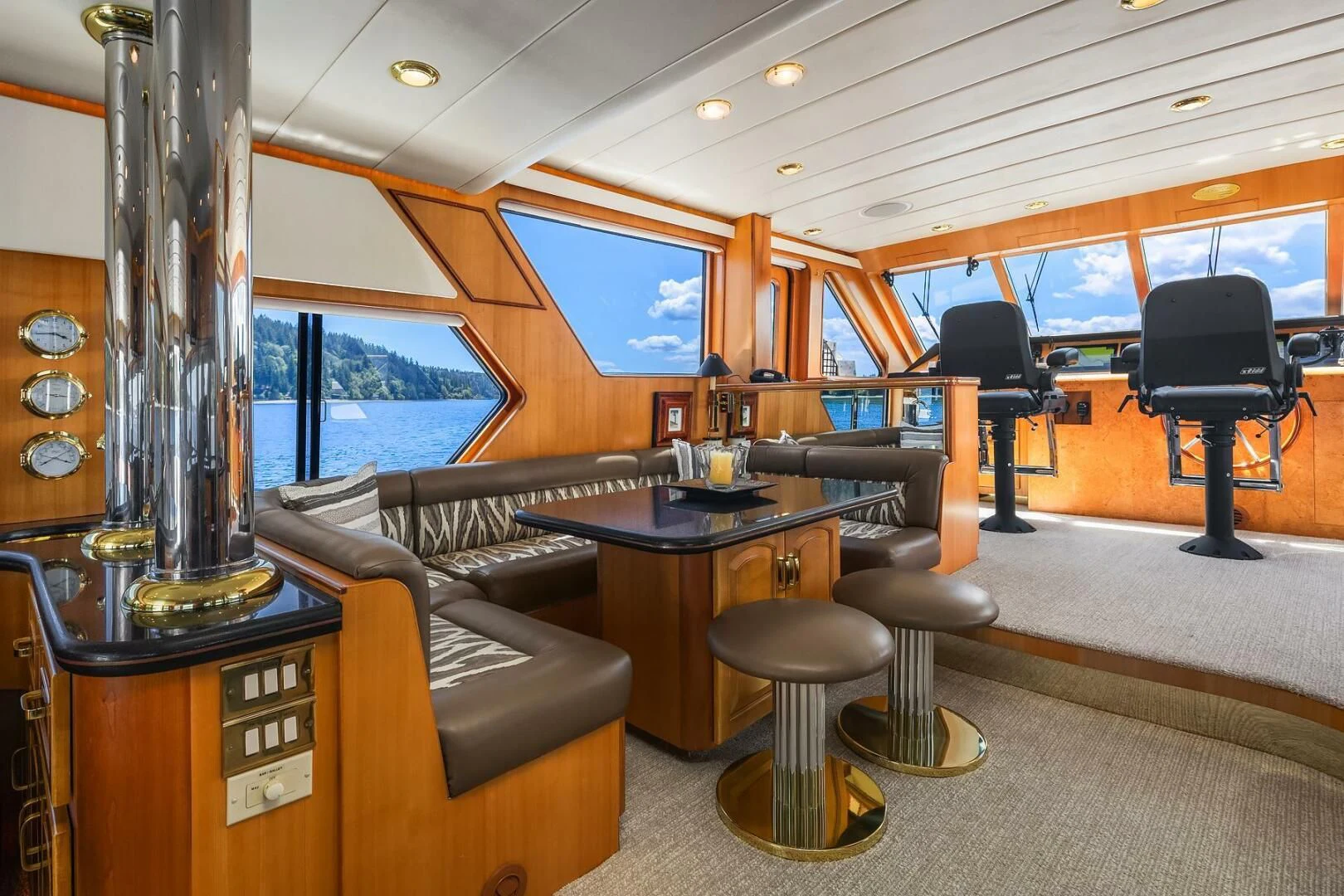 a room with a table and chairs aboard QUE SA-RAH SA-RAH Yacht for Sale