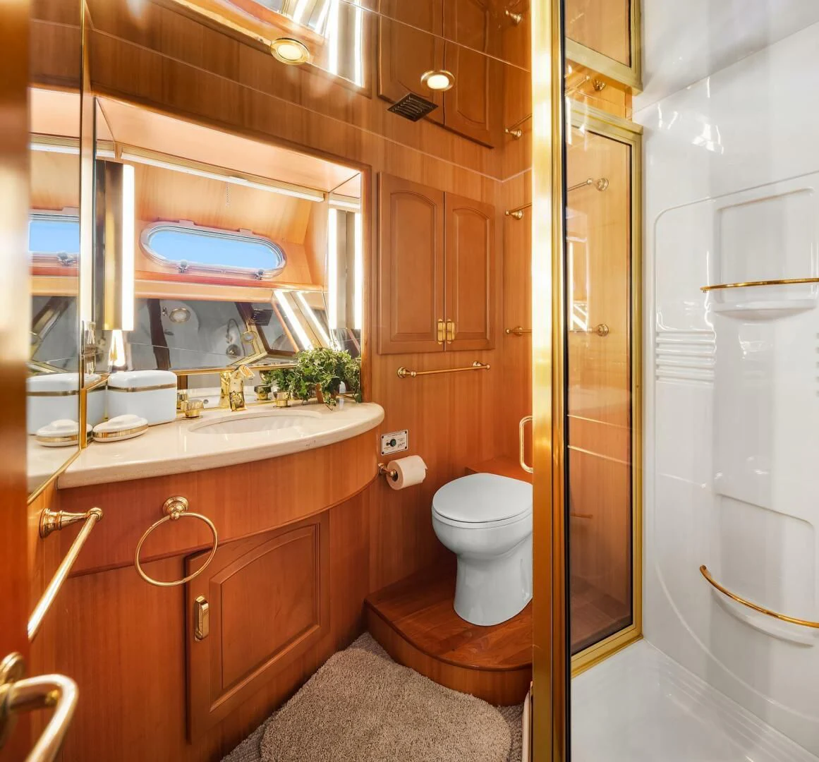 a bathroom with a sink and toilet aboard QUE SA-RAH SA-RAH Yacht for Sale