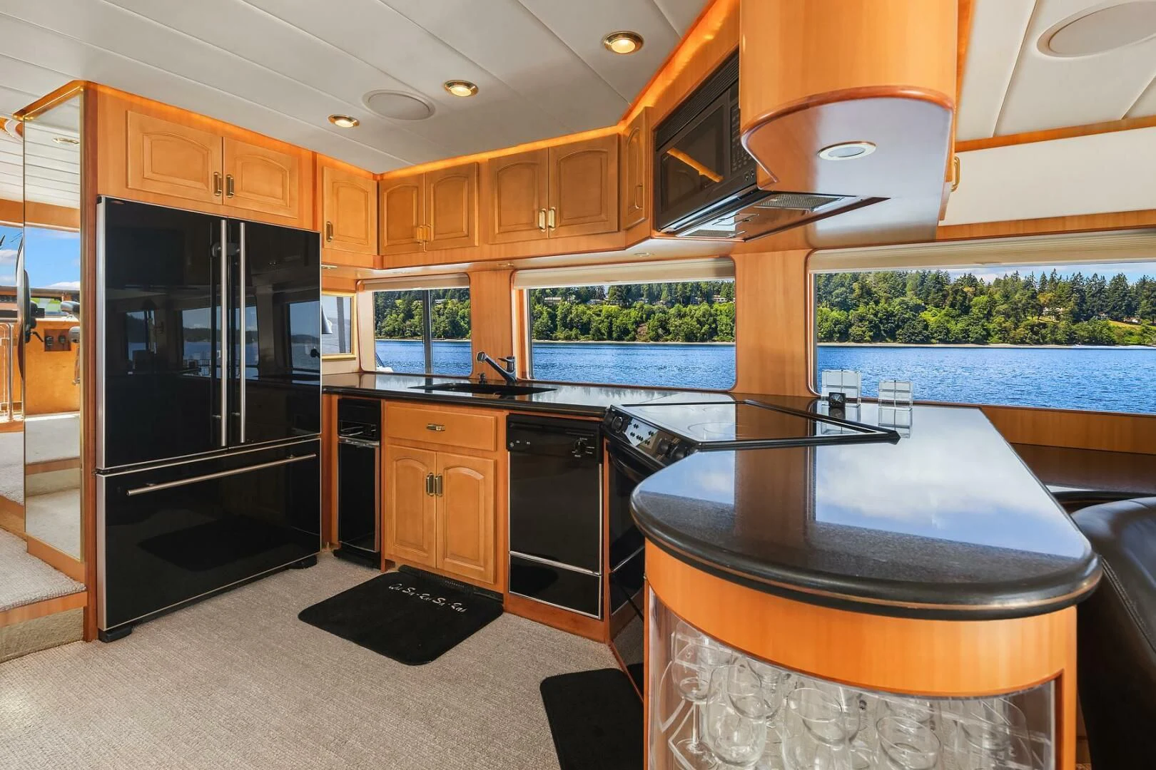 a kitchen with a large island aboard QUE SA-RAH SA-RAH Yacht for Sale