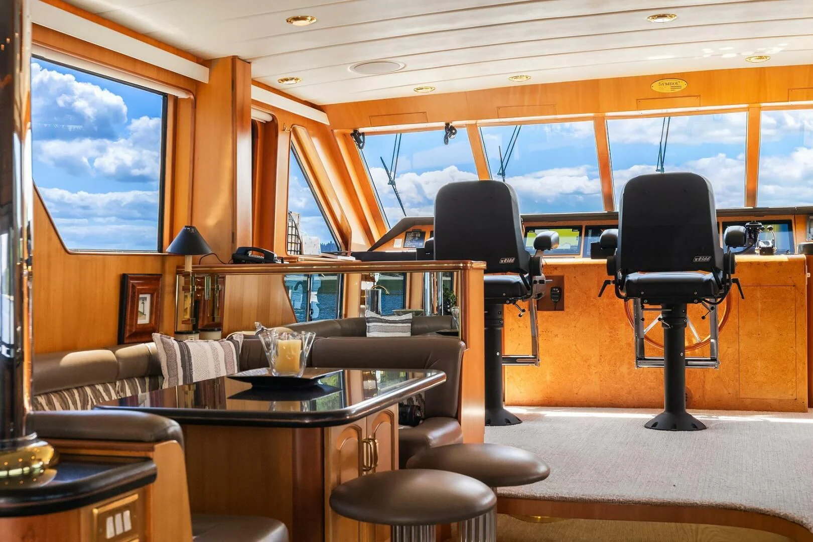 a room with a desk and chairs aboard QUE SA-RAH SA-RAH Yacht for Sale
