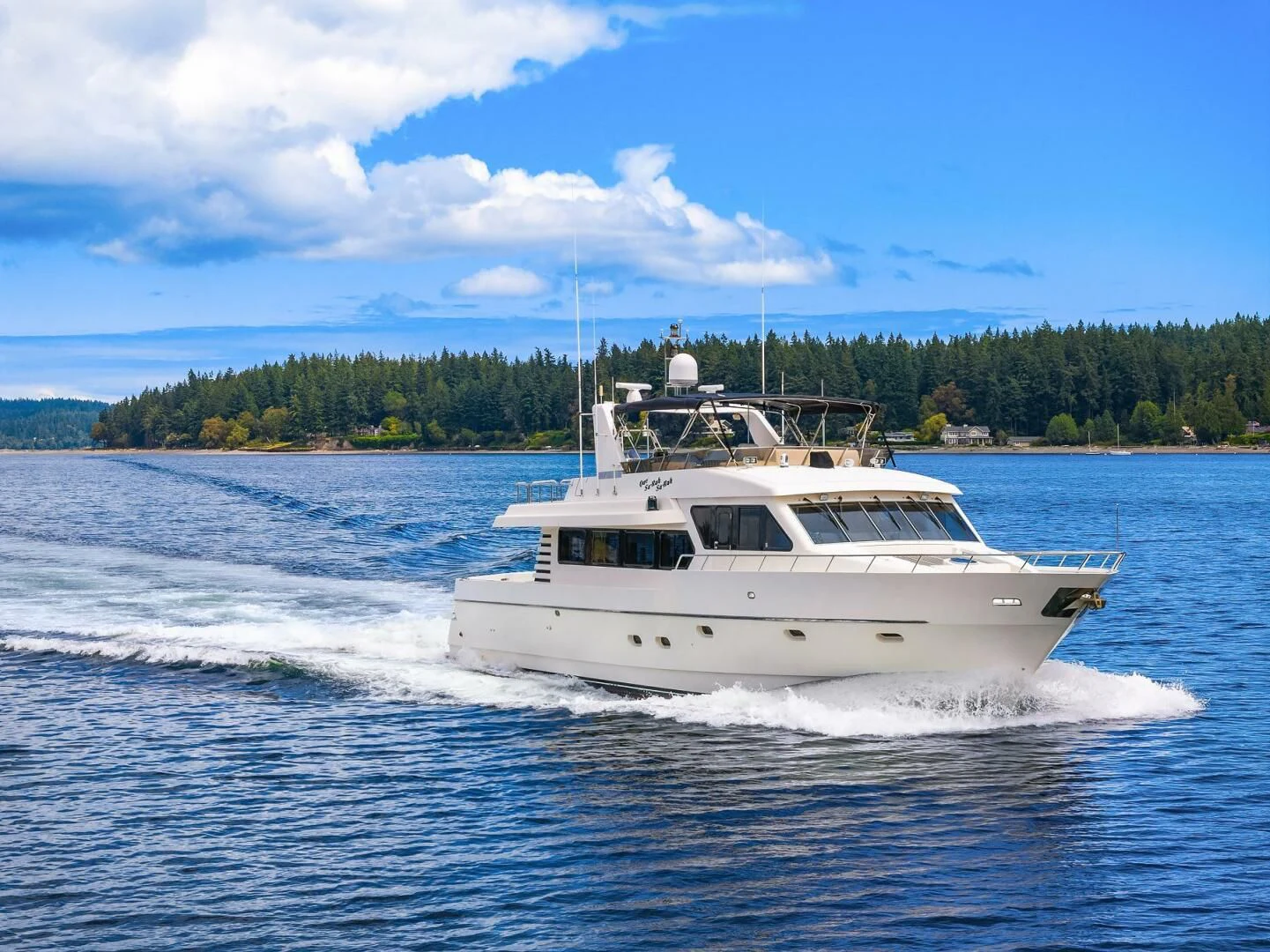 a boat on the water aboard QUE SA-RAH SA-RAH Yacht for Sale
