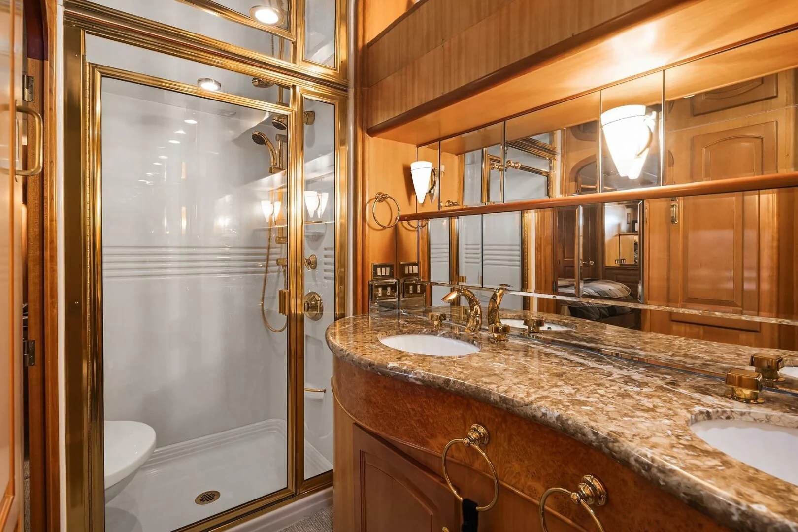 a bathroom with a glass shower aboard QUE SA-RAH SA-RAH Yacht for Sale