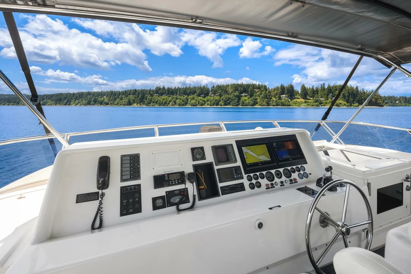 a white boat on the water aboard QUE SA-RAH SA-RAH Yacht for Sale