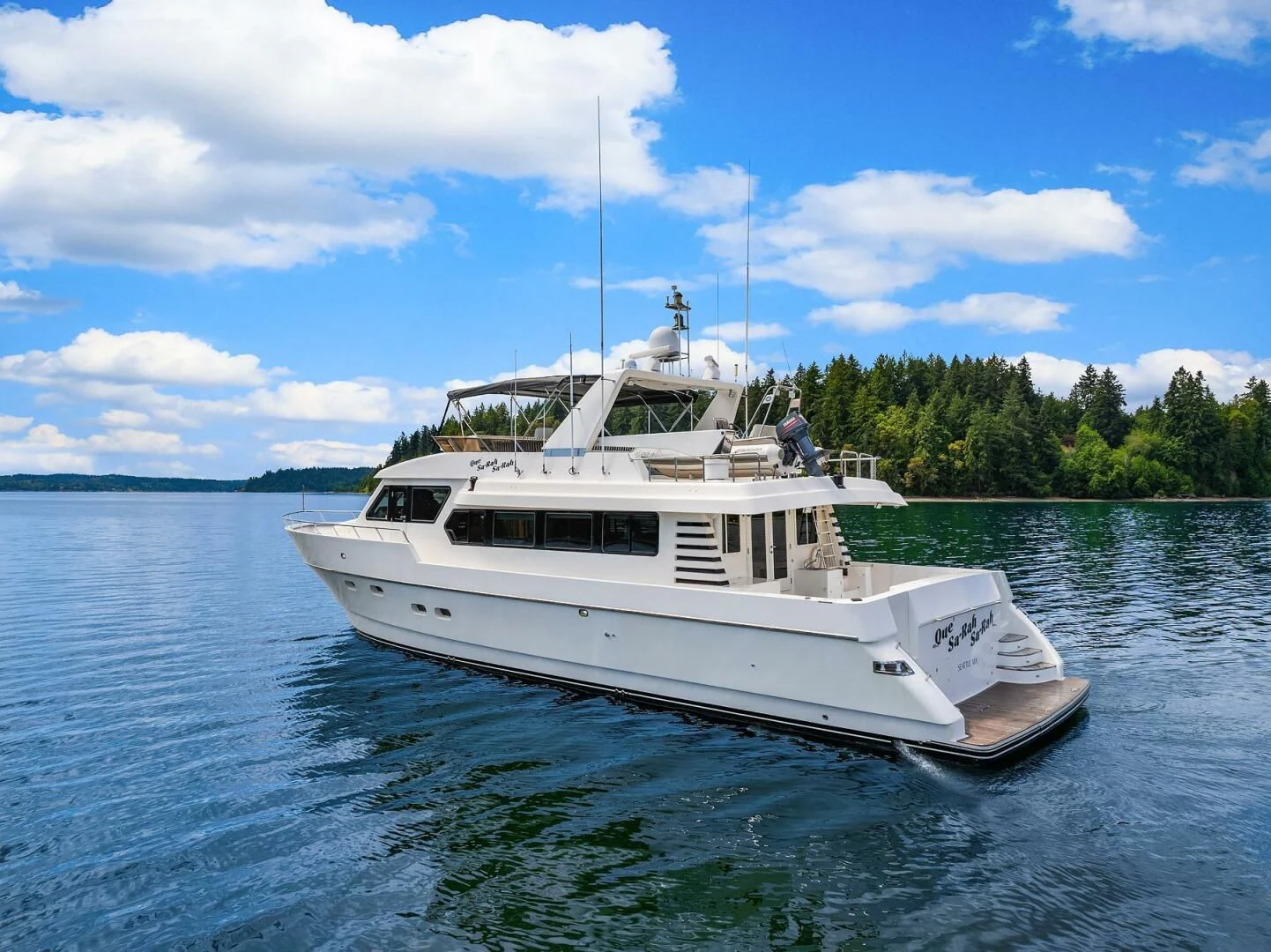 a boat on the water aboard QUE SA-RAH SA-RAH Yacht for Sale